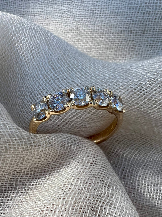 5 stone diamond eternity band.