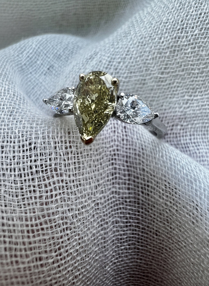 Fancy Yellow Pear Diamond ring with side Pear Diamonds
