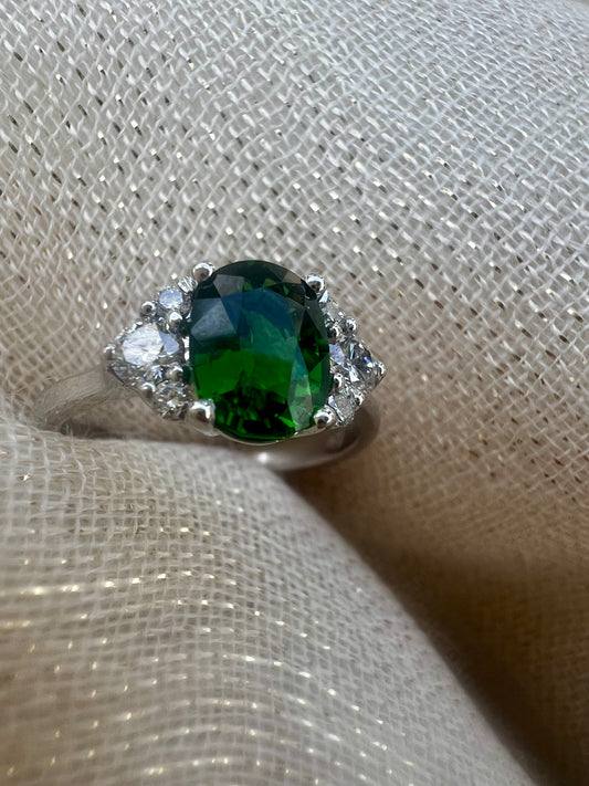 Green Tourmaline with side diamonds.