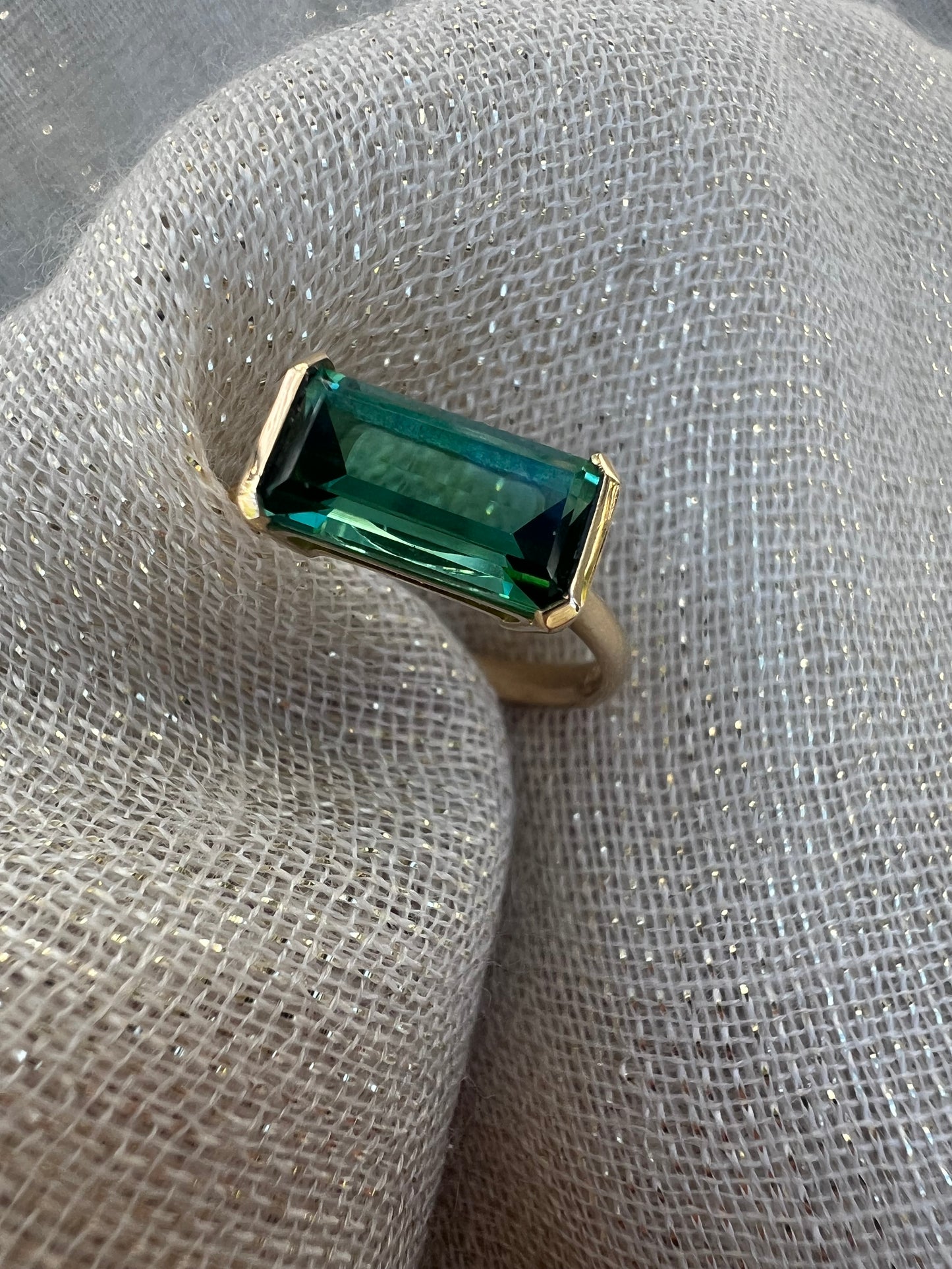 Green Tourmaline side set ring.
